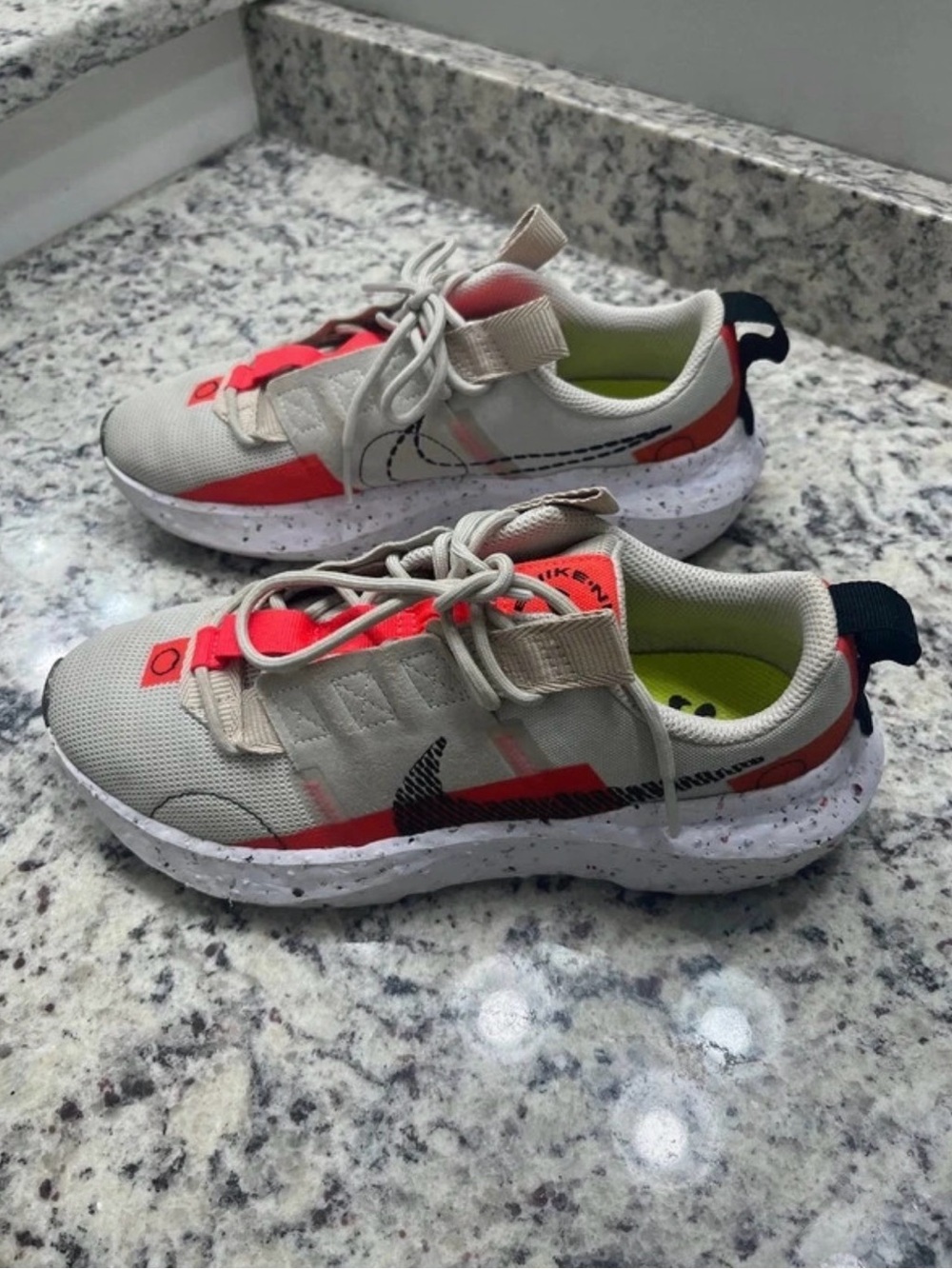 Women’s  Nike Beige and Red Athletic Sneakers with Black Swoosh